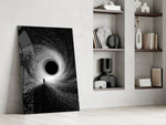 Lone Figure Before the Black Hole Glass Wall Art