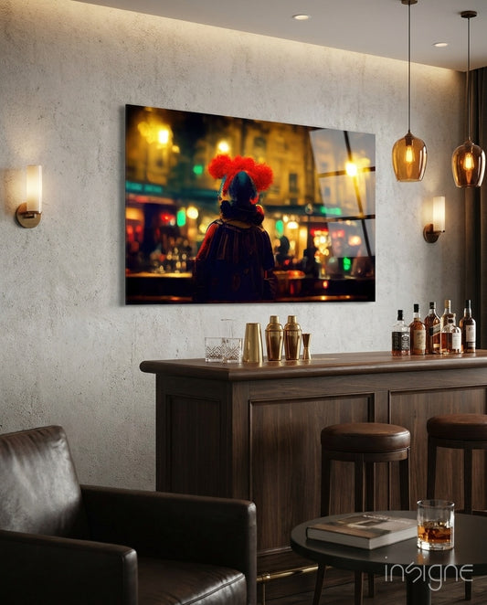 Fun glass wall art displayed above a wood bar in a moody home bar with brass pendants and dark-leather armchair