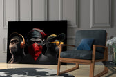 3 Wise Monkey glass print enhancing a teen lounge with cinematic mood