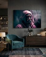 Tupac glass wall art displayed above a sideboard in a man cave