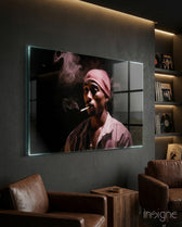 Tupac glass wall art displayed above a bar cart in a man cave