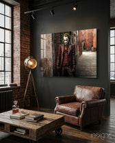 Joker glass wall art displayed above a leather sofa in a man cave