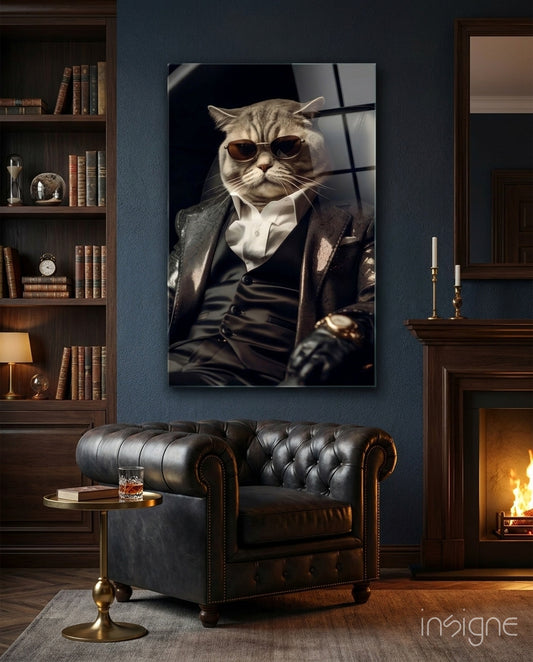 The Boss glass wall art displayed above a leather chair in a study