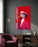 Bird Vogue glass wall art displayed above a sideboard in a living room