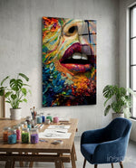 Lips and Flowers glass wall art displayed above a sideboard in a living room