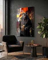 Java the Leopard glass wall art displayed above a sideboard in a coffee bar