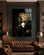 Gentleman glass wall art displayed above a leather sofa in a library