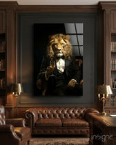 Gentleman glass wall art displayed above a leather sofa in a library