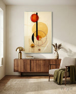 Circles glass wall art displayed above a sideboard in a living room