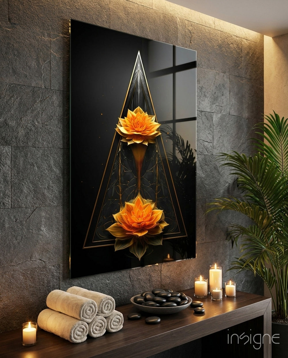 Lotus glass wall art displayed above a console in a yoga studio