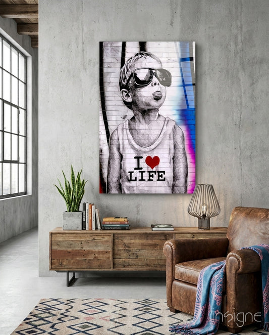 I Love Life glass wall art displayed above a sideboard in a loft
