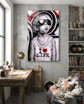 I Love Life glass wall art displayed above a desk in a teen den