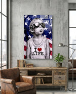 I Love Life glass wall art displayed above a console in a loft