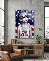 I Love Life glass wall art displayed above a console in a loft