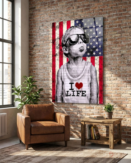 I Love Life glass wall art displayed above a chair in a loft