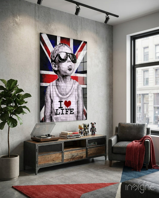 I Love Life glass wall art displayed above a media console in a loft