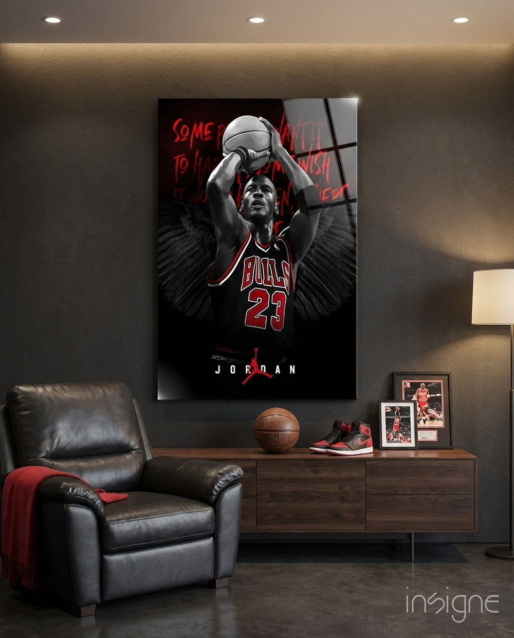 Jordan glass wall art displayed above a leather chair in a man cave