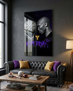 Kobe Bryant glass wall art displayed above a leather sofa in a man cave