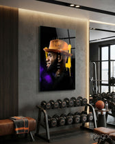 King James glass wall art displayed above a dumbbell rack in a home gym