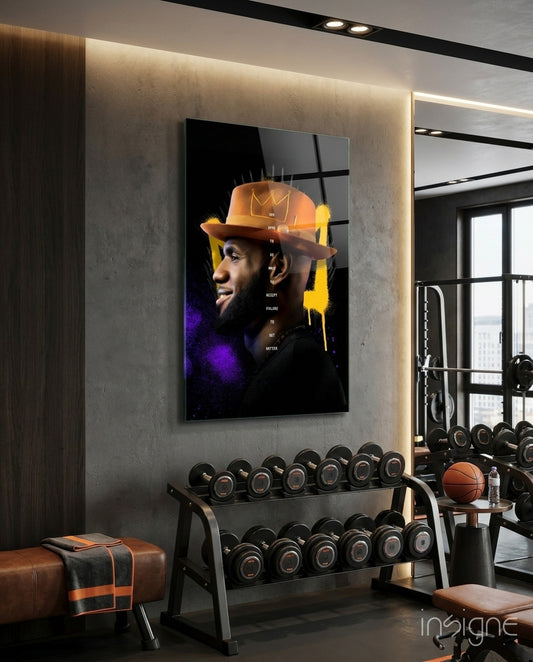 King James glass wall art displayed above a dumbbell rack in a home gym