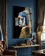 Contemporary Girl with a Pearl Earring glass wall art displayed above a console in a living room
