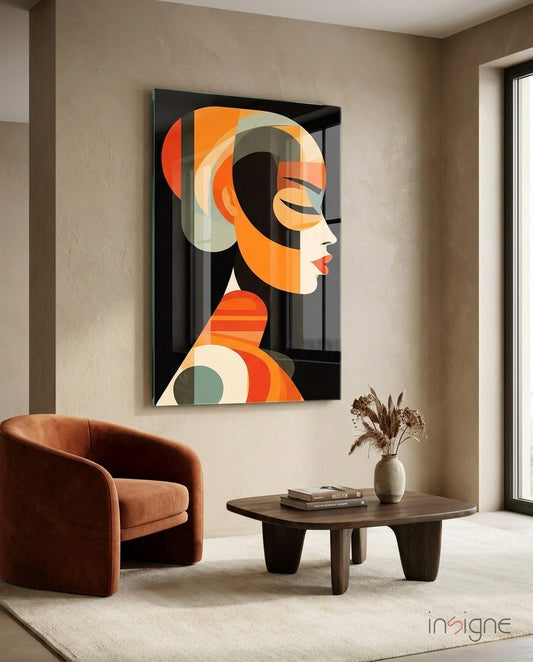 She glass wall art displayed above a sideboard in a designer studio