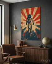 Astronaut glass wall art displayed above a sideboard in a study