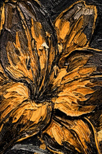 Close-up of a textured surface with floral patterns in brown and black.