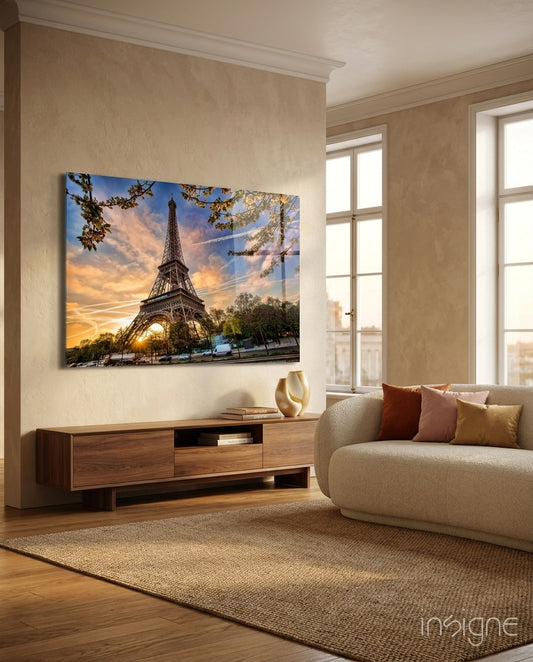 Eiffel Tower glass wall art displayed above a console in a designer interior