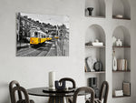 Yellow Tram glass print enhancing a dining area with cinematic mood