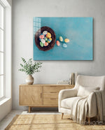 Easter Egg glass wall art displayed above a console in a designer interior