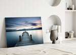 Dock glass wall art styled above a bed in a tranquil bedroom