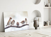 Birds glass wall art styled above a bed in a cozy, character-rich bedroom