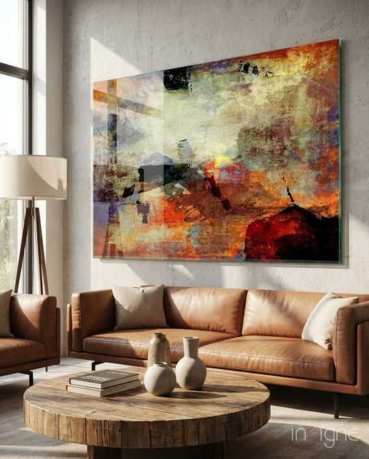 Abstract expressionist glass wall art displayed above a console in a designer interior