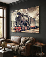 Train glass wall art displayed above a console in a designer interior