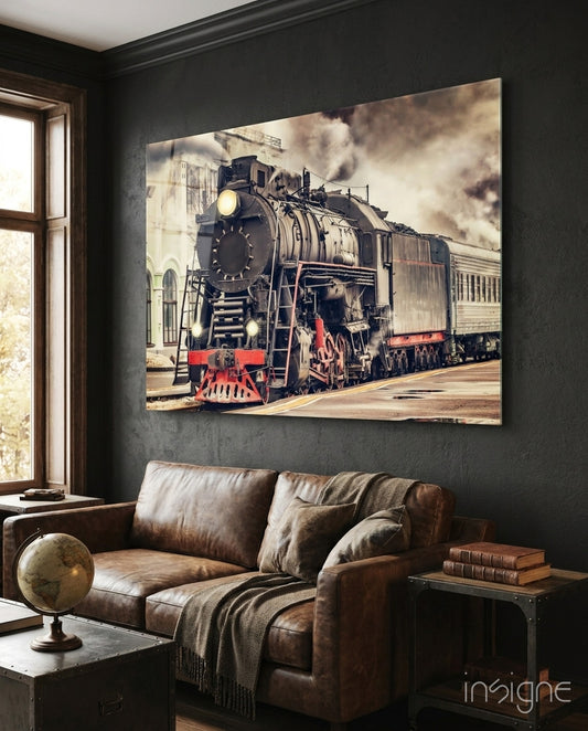 Train glass wall art displayed above a console in a designer interior