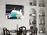 Candle glass print adding evening calm to a bedroom