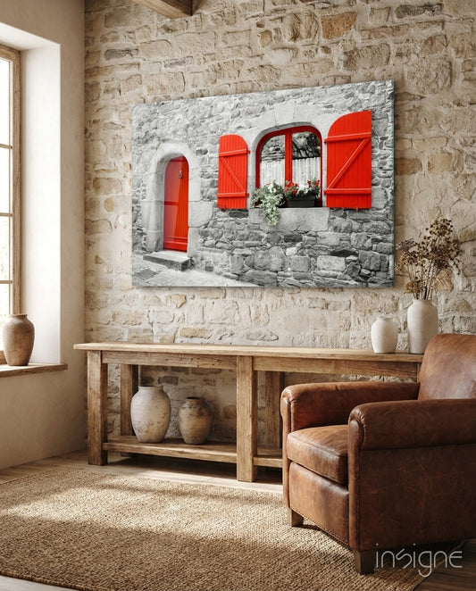Red Door glass wall art displayed above a console in a designer interior