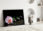 Spa glass wall art styled above a bathtub in a tranquil bathroom