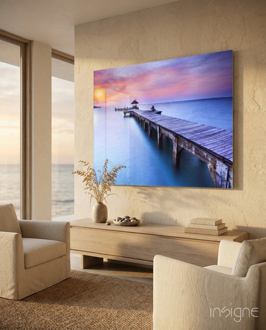 Dock tropical sunset glass wall art displayed above a console in a designer interior