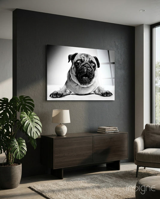 Pug glass wall art displayed above a console in a designer interior