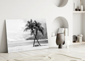 Palm Trees glass wall art styled above a bed in a holiday-mood bedroom