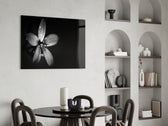 Flower glass print enhancing a bathroom with minimalist dark mood