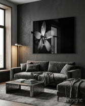 Flower minimalist bloom glass wall art displayed above a console in a designer interior