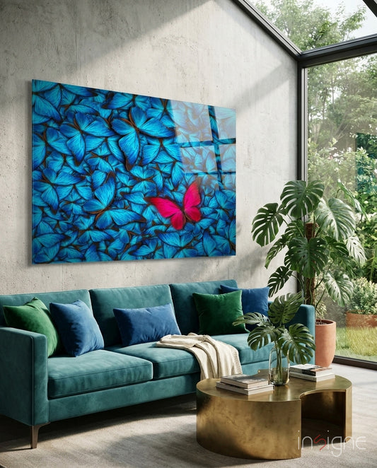Butterfly glass wall art displayed above a console in a designer interior