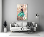 Female glass wall art styled above a vanity in a fashion-forward dressing area