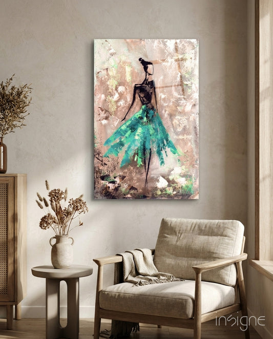 Female turquoise glass wall art displayed above a console in a designer interior