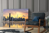 Downtown artwork above a dining table with skyline drama