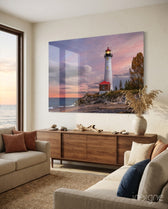 Lighthouse glass wall art displayed above a console in a designer interior