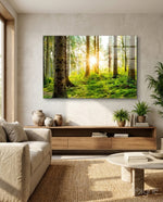 Forest glass wall art displayed above a console in a designer interior